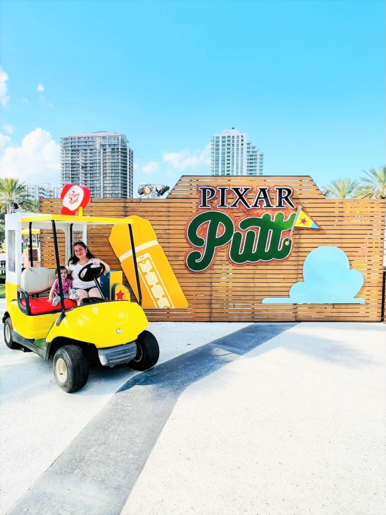 Photo of family at Pixar Putt Pop-up Fort Lauderdale