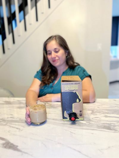 Photo of girl with Wandering Bear Cold Brew Coffee