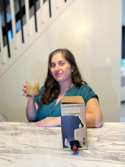 Photo of girl with Wandering Bear Cold Brew Coffee