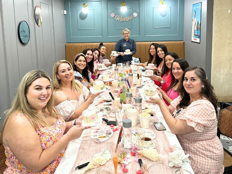 Photo of girls at Bubbles and Buttercream Galentines Event at New River Cafe and Bakery