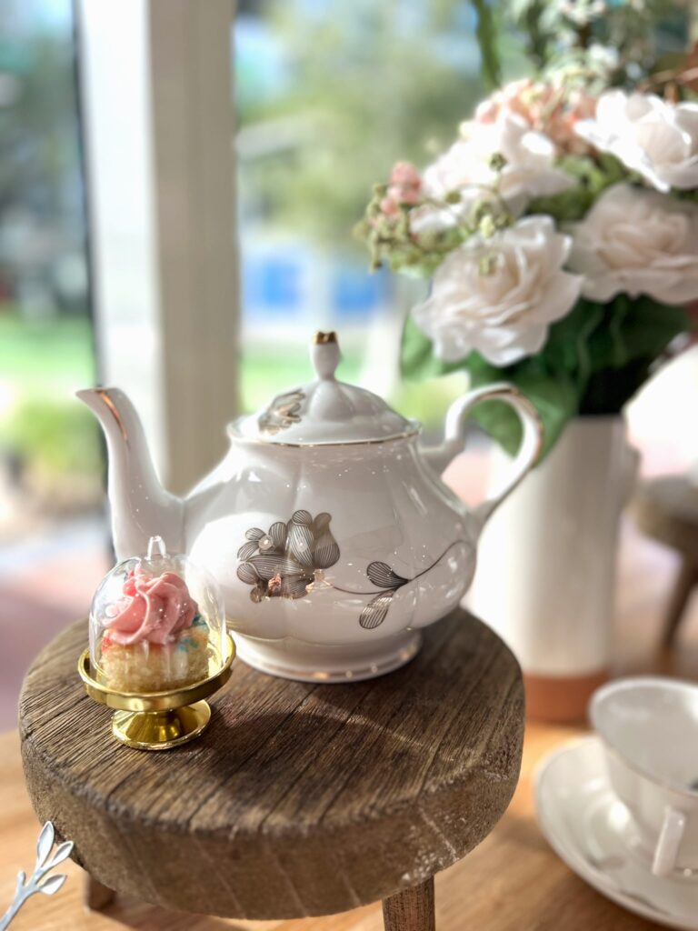 Photo of Bubbles and Buttercream Galentines Event Tea Decor at New River Cafe and Bakery