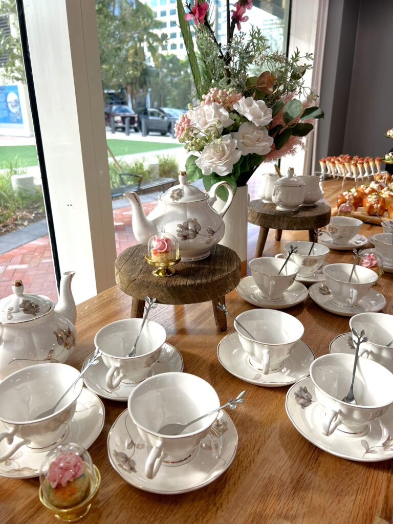 Photo of Bubbles and Buttercream Galentines Event Tea Decor at New River Cafe and Bakery