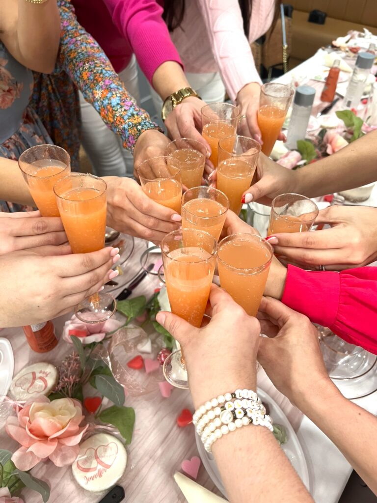 Photo of drinks at Bubbles and Buttercream Galentines Event at New River Cafe and Bakery