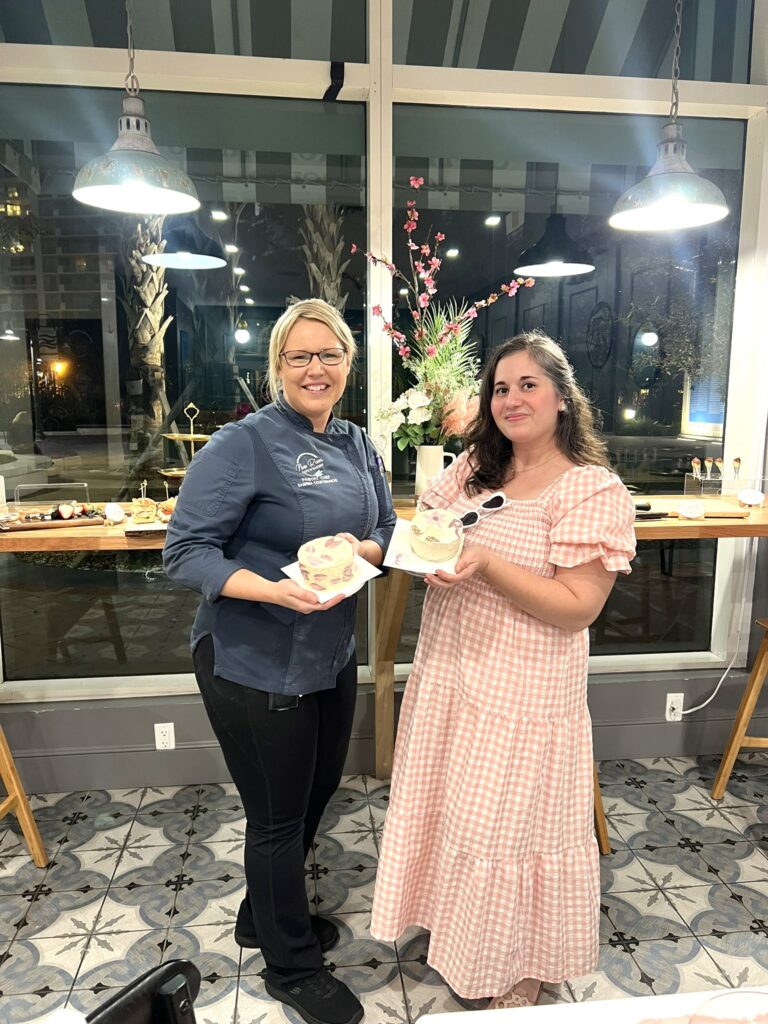 Photo of Cultured Local Influencer with Chef Sabrina at Bubbles and Buttercream Galentines Event at New River Cafe and Bakery