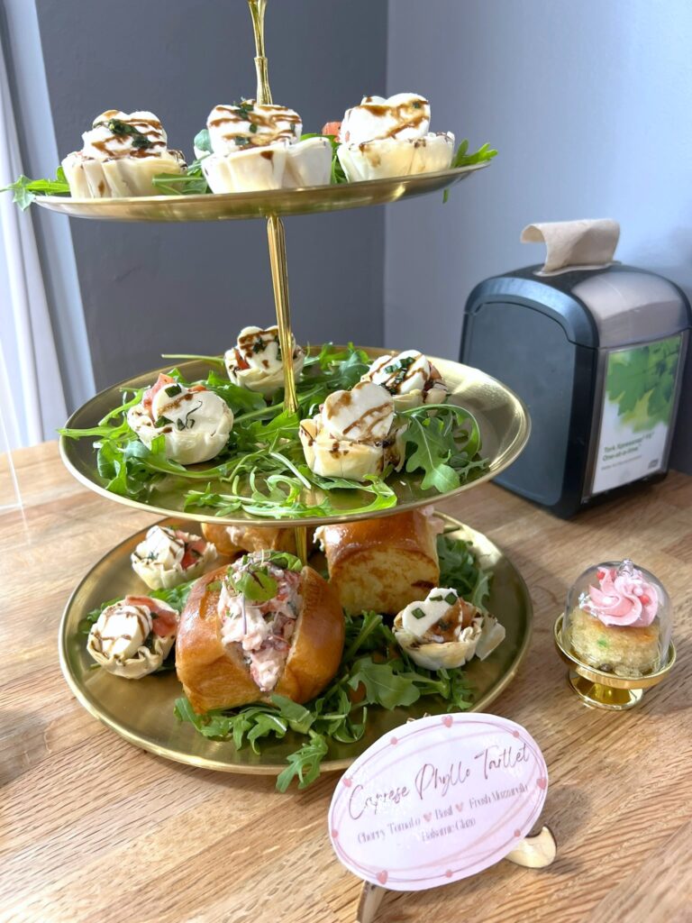 Photo of Bubbles and Buttercream Galentines Event Food Spread at New River Cafe and Bakery